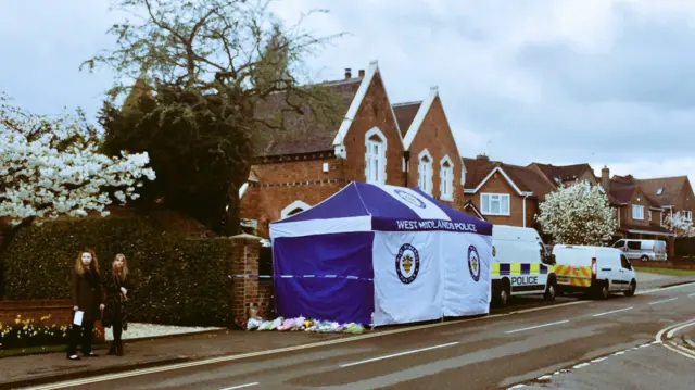 
          Police outside family home in Norton where the stabbing took place
        