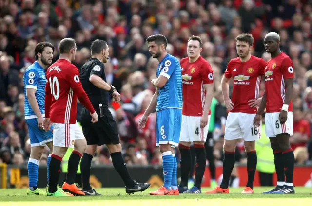 Bournemouth's Andrew Surman receives a red card