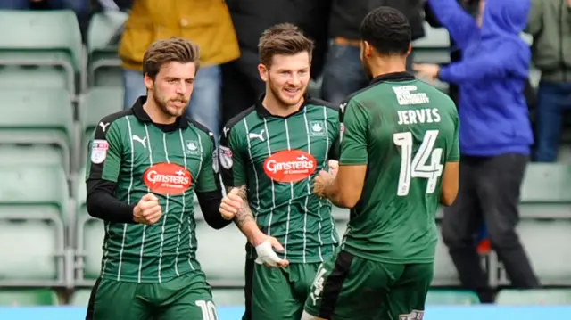 Graham Carey celebrates scoring against Carlisle