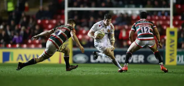 
          Ian Whitten of Exeter runs with the ball during the Aviva Premiership match between Leicester Tigers and Exeter Chiefs
        