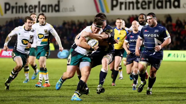 Ethan Waller of Northampton Saints attacks