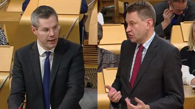 
          Derek Mackay (left) and Murdo Fraser clashed in the Holyrood chamber ahead of the final budget vote
        