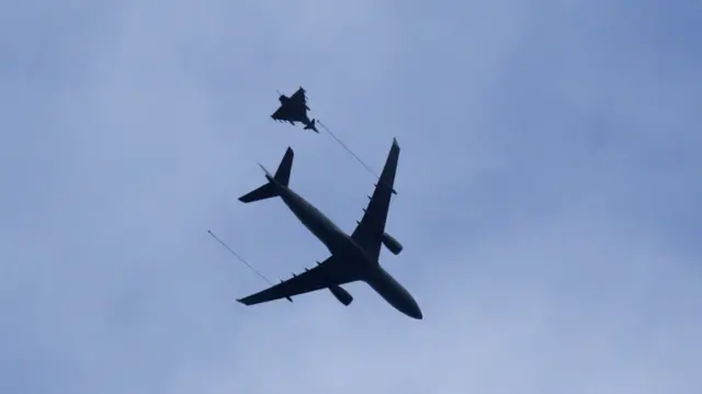 
          After escorting the plane, one of the Typhoons flew alongside an A330 Voyager refuelling tanker
        