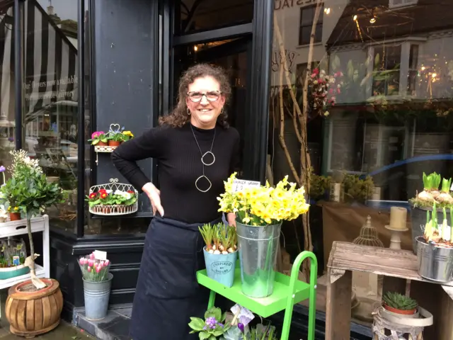 Jane Antoniades outside her shop