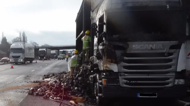 Fire crews working to clear the lorry