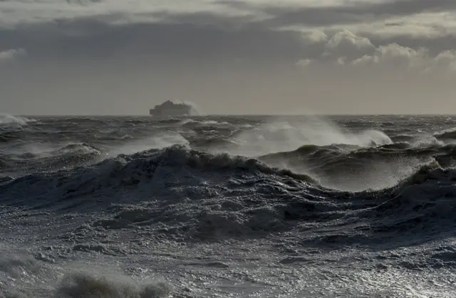 
          A ferry battles the waves after leaving the harbour in Newhaven
        