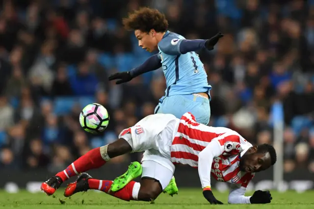 
          Mame Biram Diouf is hurt in this tangle with Manchester City"s  midfielder Leroy Sane
        