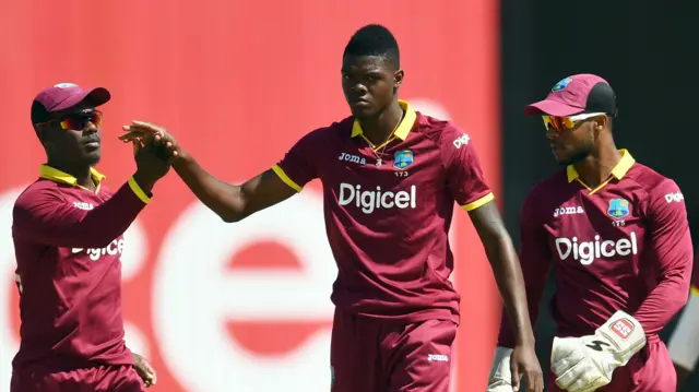 Alzarri Joseph celebrates