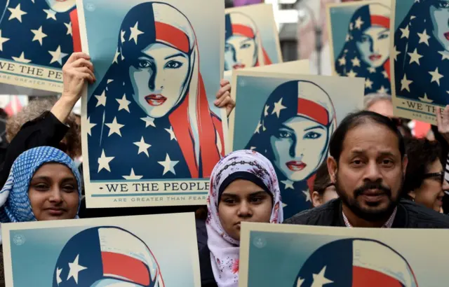 
          Protesters march in New York's Times Square in solidarity with American Muslims
        