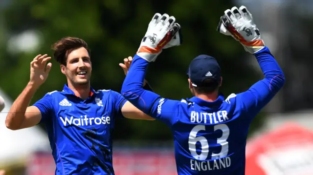 Steven Finn celebrates