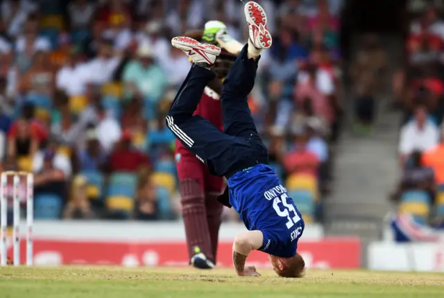 Ben Stokes tries to field a shot from Jonathan Carter