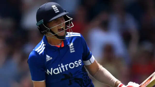 Joe Root celebrates his century