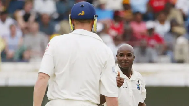 Andrew Flintoff and Tino Best during a match in 2004