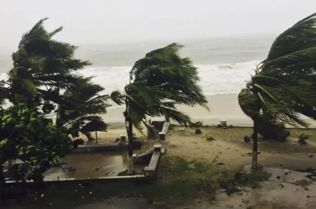 
          Trees are lashed by strong winds in Sambava, Madagascar Tuesday, March 7, 2017
        