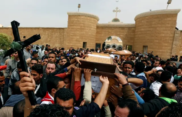 
          Relatives mourn for the victims of the Palm Sunday bombings during their funeral at the Monastery of Saint Mina "Deir Mar Mina" in Alexandria, Egypt April 10, 2017
        