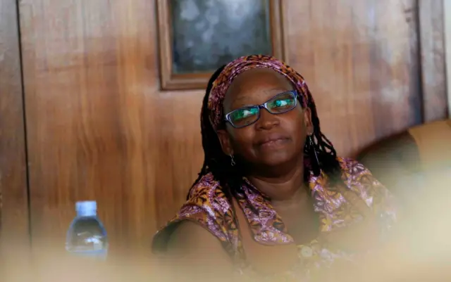 
          Ugandan prominent academic Stella Nyanzi stands in the dock at Buganda Road court for criticising the wife of President Yoweri Museveni on social media, in Kampala, Uganda April 10, 2017.
        