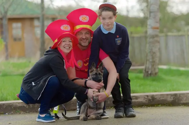 Police dog and family