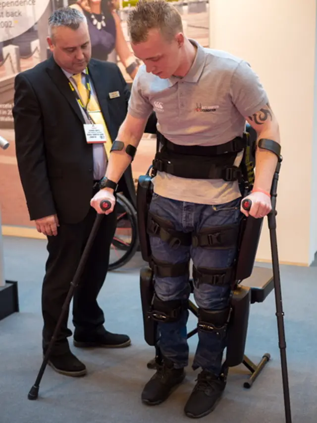 Spencer demonstrating robotic legs