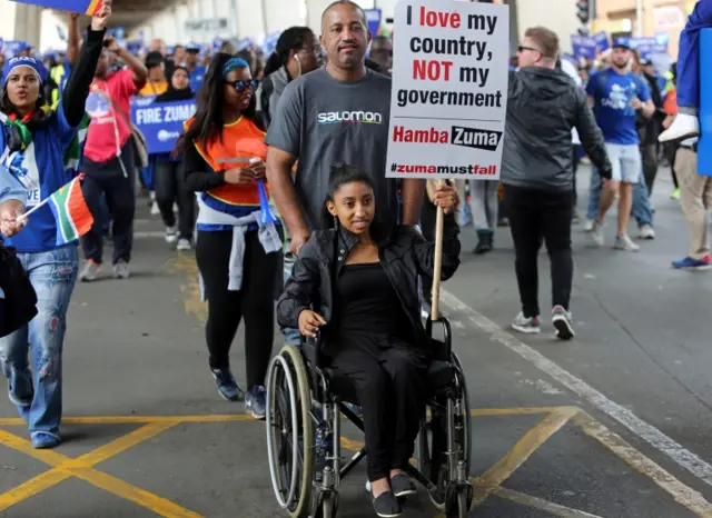 
          Demonstrators take part in a protest calling for the removal of South Africa"s President Jacob Zuma, in Johannesburg, South Africa April 7, 2017.
        