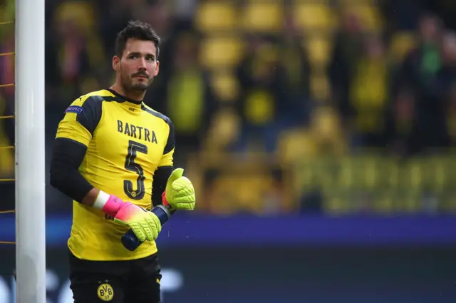 Roman Buerki of Borussia Dortmund wears the number 5 shirt worn by the injured Marc Bartra