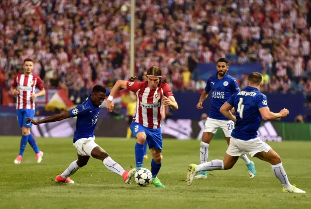 Wilfred Ndidi vies with Atletico Madrid's Filipe Luis