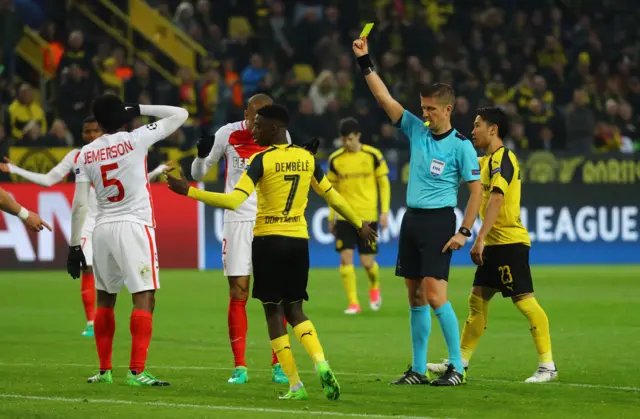 Monaco"s Jemerson is shown a yellow card