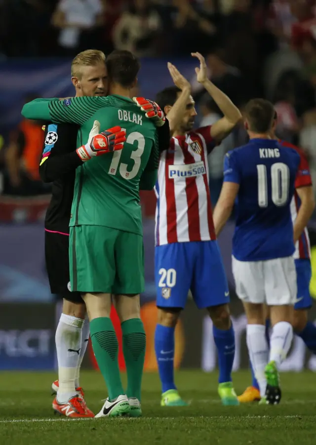 Kasper Schmeichel and Atletico Madrid's Jan Oblak after the game