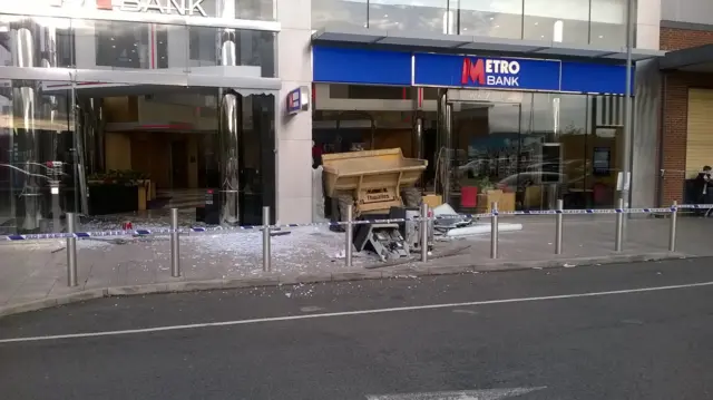 Broken glass outside a MK bank