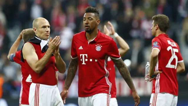 Bayern Munich"s Arjen Robben and Bayern Munich"s Jerome Boateng look dejected