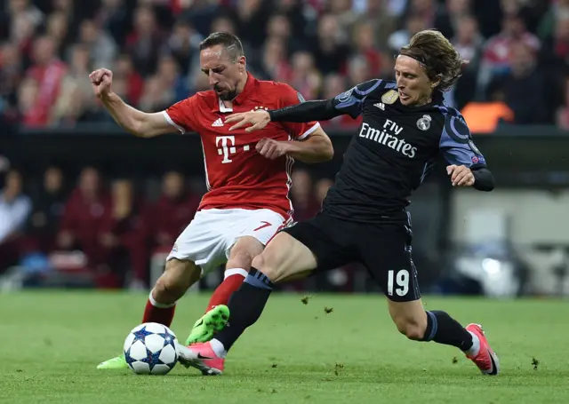 Real Madrid#s Luka Modric and Bayern Munich's Franck Ribery