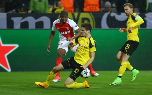 Borussia Dortmund"s Julian Weigl in action with Monaco"s Almamy Toure