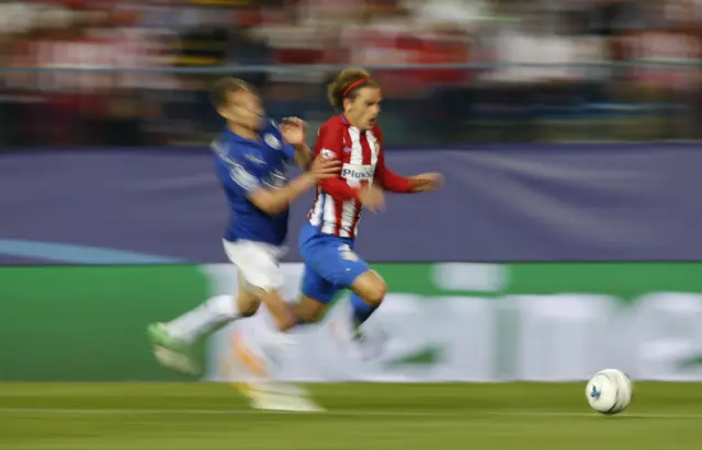 Leicester City"s Marc Albrighton fouls Atletico Madrid"s Antoine Griezmann for a penalty