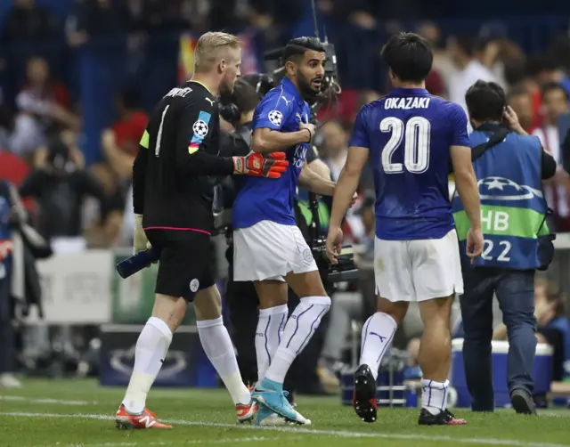 Leicester players leave the pitch