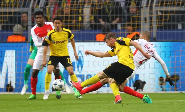 Borussia Dortmund"s Lukasz Piszczek shoots at goa