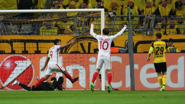 Radamel Falcao and Bernardo Silva of AS Monaco celebrate the own goal scored by Sven Bender