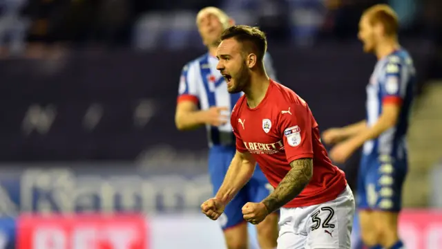 Adam Armstrong celebrates