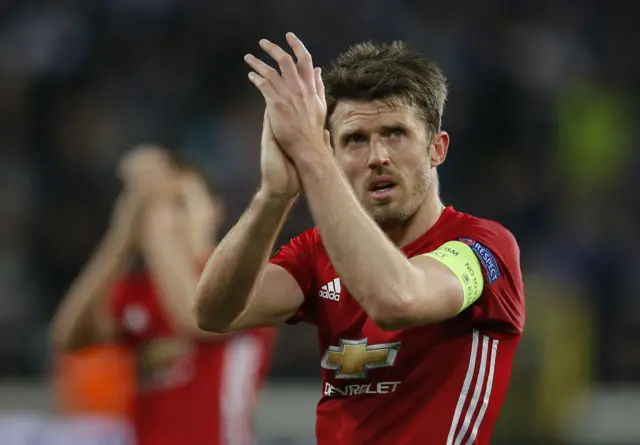 Michael Carrick applauds fans