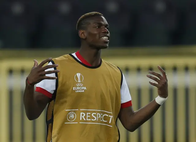 Paul Pogba warms up