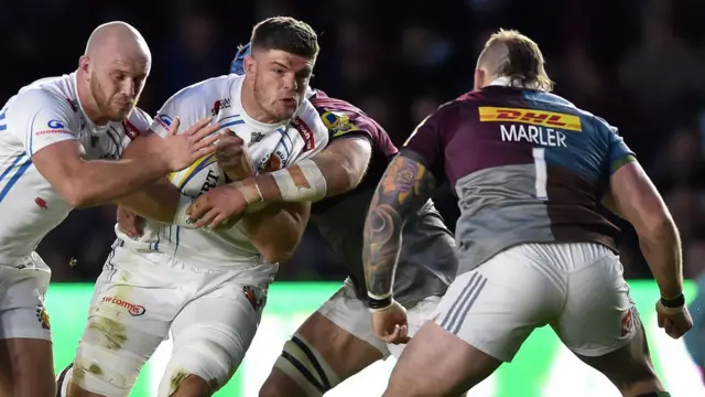 Dave Ewers of Exeter Chiefs takes on the Harlequins defence