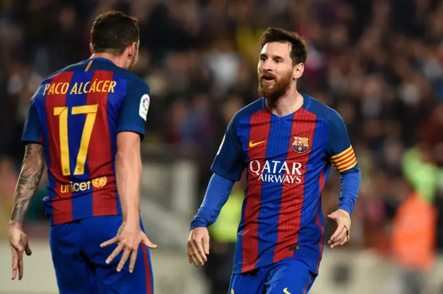 Paco Alcacer celebrates with Lionel Messi