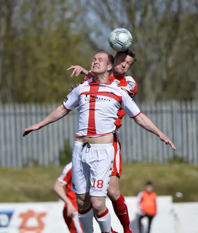 Crusaders striker and Cliftonville captain Jason McGuinness