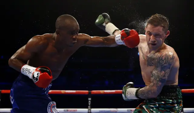 Julius Indongo catches Ricky Burns with a punch