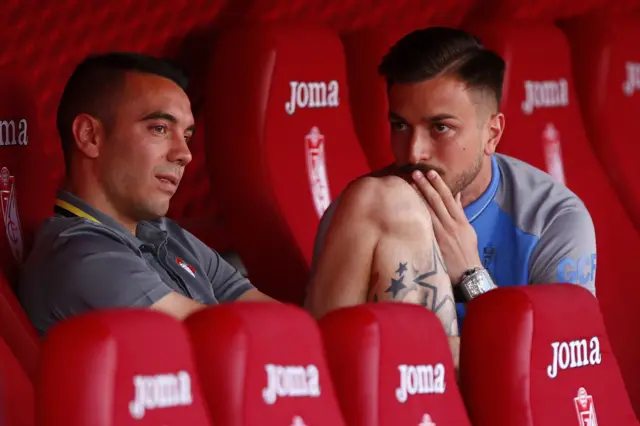 Iago Aspas (left)