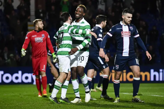 Moussa Dembele celebrates a last-minute goal for Celtic in Dingwall