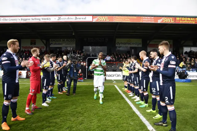 Celtic are applauded on to the park by the hosts