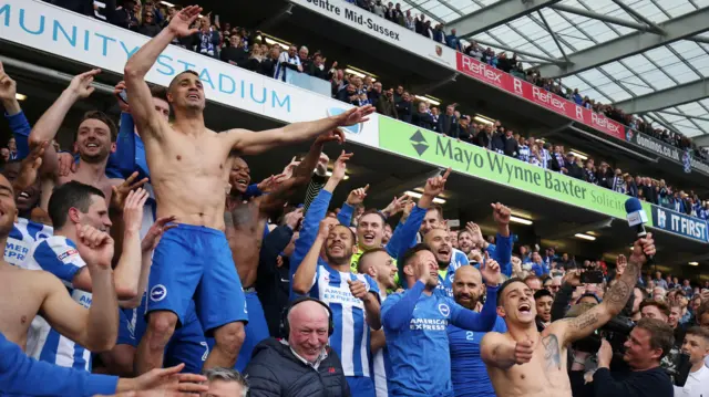 Brighton players celebrate