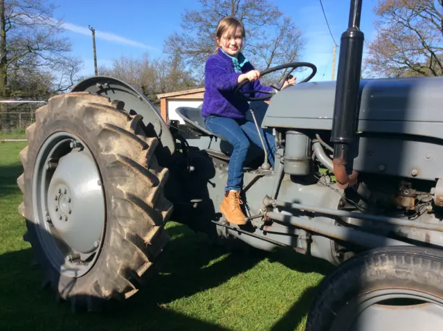 9year old Grace Haynes on board one of the vintage tractors