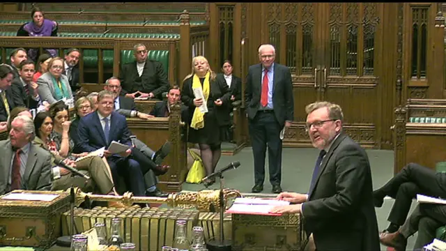 The SNP's Angus Robertson watches as Scottish Secretary David Mundell speaks