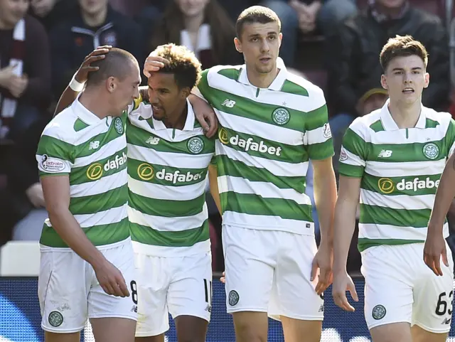 
          Celtic celebrate the first of Scott Sinclair's two strikes at Tynecastle
        