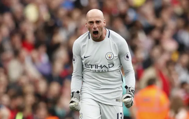 Willy Caballero celebrates